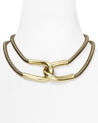 Giles & Brothers make chic work of the industrial-inspired jewelry trend with this brass oxide collar necklace. With polished links and a bold look, it encapsulates downtown cool. Giles & Brothers make chic work of the industrial-inspired jewelry trend with this brass oxide collar necklace. With polished links and a bold look, it encapsulates downtown cool.