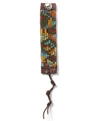 Eclectically embellished with faceted beads, Chan Luu's leather cuff is coolly boho. Do like the hippie-chic and layer it with similar strands to give breezy looks a touch of tribal-inspired texture. Eclectically embellished with faceted beads, Chan Luu's leather cuff is coolly boho. Do like the hippie-chic and layer it with similar strands to give breezy looks a touch of tribal-inspired texture.
