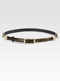Shiny glazed leather, fastened with a square buckle and accented with goldtone chain details.About ½ wideLeatherMade in Italy of imported fabric Shiny glazed leather, fastened with a square buckle and accented with goldtone chain details.About ½ wideLeatherMade in Italy of imported fabric