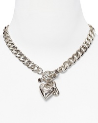 This shiny necklace is super cute with dangling iconic hearts with Juicy script and iconic J charm. This shiny necklace is super cute with dangling iconic hearts with Juicy script and iconic J charm.