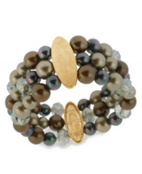 Quite a stretch. Kenneth Cole New York's stretch bracelet is crafted from gold-tone mixed metal with oval accents, as well as rows of green glass pearls and beads for a stunning statement. Item comes packaged in a signature Kenneth Cole New York Gift Box. Approximate length: 7-1/2 inches. Approximate width: 1-1/5 inches. Quite a stretch. Kenneth Cole New York's stretch bracelet is crafted from gold-tone mixed metal with oval accents, as well as rows of green glass pearls and beads for a stunning statement. Item comes packaged in a signature Kenneth Cole New York Gift Box. Approximate length: 7-1/2 inches. Approximate width: 1-1/5 inches.