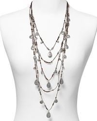 Lauren Ralph Lauren pays homage to Southwestern style with this layered drop necklace, accented by an evocative cascade of natural cord and textured silver-plated teardrop beads. Lauren Ralph Lauren pays homage to Southwestern style with this layered drop necklace, accented by an evocative cascade of natural cord and textured silver-plated teardrop beads.