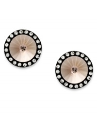 These stud earrings from Juicy Couture are crafted primarily from silver tone brass with a titanium post, and feature glass accents around the border for that extra bit of shine. Approximate diameter: 1/2 inch. These stud earrings from Juicy Couture are crafted primarily from silver tone brass with a titanium post, and feature glass accents around the border for that extra bit of shine. Approximate diameter: 1/2 inch.