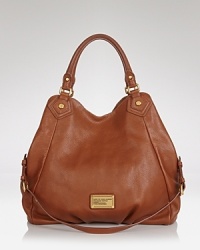 Lend your workday looks sophisticated panache with this luxurious leather tote from MARC BY MARC JACOBS. Lend your workday looks sophisticated panache with this luxurious leather tote from MARC BY MARC JACOBS.