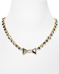 Girly with a bit of grit, this MARC BY MARC JACOBS necklace is fit to be tied, styled with a bow-shaped pendant. Girly with a bit of grit, this MARC BY MARC JACOBS necklace is fit to be tied, styled with a bow-shaped pendant.