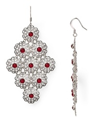 The floral motif goes completely glam on this pair of Aqua earrings, set in plated metal and accented by a cascade of romantic stones. The floral motif goes completely glam on this pair of Aqua earrings, set in plated metal and accented by a cascade of romantic stones.