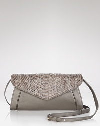The options are truly endless with this See by Chloé clutch. Carry it over the shoulder to work a bohemian vibe, or tuck it under your arm for chic, city accessorizing. The options are truly endless with this See by Chloé clutch. Carry it over the shoulder to work a bohemian vibe, or tuck it under your arm for chic, city accessorizing.