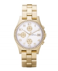 Feel like you're sitting in the lap of luxury with this indulgent Henry watch by Marc by Marc Jacobs. Gold ion-plated stainless steel bracelet and round case. Bezel embellished with crystal accents. White chronograph dial features applied goldtone numerals at markers, date window at three o'clock, three goldtone subdials, three hands and subtle logo. Quartz movement. Water resistant to 30 meters. Two-year limited warranty. Feel like you're sitting in the lap of luxury with this indulgent Henry watch by Marc by Marc Jacobs. Gold ion-plated stainless steel bracelet and round case. Bezel embellished with crystal accents. White chronograph dial features applied goldtone numerals at markers, date window at three o'clock, three goldtone subdials, three hands and subtle logo. Quartz movement. Water resistant to 30 meters. Two-year limited warranty.