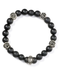 Break with conventional accessories. This hard-hitting sterling silver and onyx bracelet from Queen Baby is equal parts edgy and glamorous, accented by delicate silver rosettes. Break with conventional accessories. This hard-hitting sterling silver and onyx bracelet from Queen Baby is equal parts edgy and glamorous, accented by delicate silver rosettes.