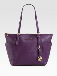 A polished design in luxurious saffiano leather accented with radiant hardware.Double adjustable shoulder straps, 8½-10½ dropTop zip closureTwo outside open pocketsOne inside zip pocketFour inside open pocketsFully lined10½W X 10H X 4½DImported A polished design in luxurious saffiano leather accented with radiant hardware.Double adjustable shoulder straps, 8½-10½ dropTop zip closureTwo outside open pocketsOne inside zip pocketFour inside open pocketsFully lined10½W X 10H X 4½DImported