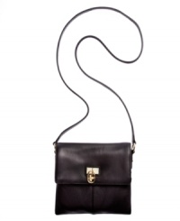 Simple and classic, this take-anywhere silhouette from Calvin Klein is crafted in sumptuous leather with discrete signature hardware. A secure front flap closure and compact crossbody design make it a must-have for weekends, errands, travel, and more. Simple and classic, this take-anywhere silhouette from Calvin Klein is crafted in sumptuous leather with discrete signature hardware. A secure front flap closure and compact crossbody design make it a must-have for weekends, errands, travel, and more.