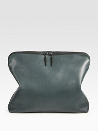 A contemporary design of supple leather with a polished finish. Top handle, 1 dropZip-top closureOne inside zip pocket15W X 6H X 3½DImported A contemporary design of supple leather with a polished finish. Top handle, 1 dropZip-top closureOne inside zip pocket15W X 6H X 3½DImported