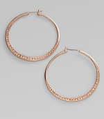A rose goldtone design with colored pavé stone details. BrassColored glass stoneLength, about 1¾Hinge-and-post backImported 