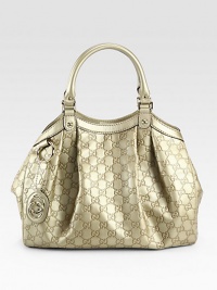 Lustrous logo-stamped leather takes on a metallic sheen in this softly-pleated carryall finished with logo hardware.Double top handles, 6½ dropTop snap-strap closureOne inside zip pocketLinen lining14¼W X 10¼H X 6¼DMade in Italy Lustrous logo-stamped leather takes on a metallic sheen in this softly-pleated carryall finished with logo hardware.Double top handles, 6½ dropTop snap-strap closureOne inside zip pocketLinen lining14¼W X 10¼H X 6¼DMade in Italy