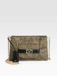 An exotic style in lush haircalf with a stunning leopard print and goldtone hardware.Detachable shoulder strap, 22 dropMagnetic flap closureOne outer zip compartmentTwo open and one zip inner compartmentsOne pen holderFully lined12W X 8H X 1DImported An exotic style in lush haircalf with a stunning leopard print and goldtone hardware.Detachable shoulder strap, 22 dropMagnetic flap closureOne outer zip compartmentTwo open and one zip inner compartmentsOne pen holderFully lined12W X 8H X 1DImported
