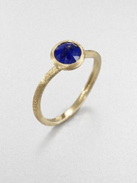 From the Jaipur Resort Collection. A delicate, brushstroke texture distinguishes the band and setting of this stunningly simple ring, topped with a faceted stone of deeply hued, gold-flecked lapis.Lapis18k yellow goldDiameter, about .25Made in Italy From the Jaipur Resort Collection. A delicate, brushstroke texture distinguishes the band and setting of this stunningly simple ring, topped with a faceted stone of deeply hued, gold-flecked lapis.Lapis18k yellow goldDiameter, about .25Made in Italy