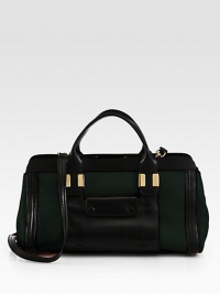 Supple Italian leather in dramatically contrasting hues form this structured design with a detachable strap for versatility. Detachable shoulder strap, 21¼ dropDouble top handles, 4 dropTop zip closureTwo outside open pocketsProtective metal feetOne inside zip pocketOne inside open pocketCotton lining14W X 8½H X 7¾DMade in Italy Supple Italian leather in dramatically contrasting hues form this structured design with a detachable strap for versatility. Detachable shoulder strap, 21¼ dropDouble top handles, 4 dropTop zip closureTwo outside open pocketsProtective metal feetOne inside zip pocketOne inside open pocketCotton lining14W X 8½H X 7¾DMade in Italy