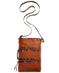 Every laid-back look deserves some fashionista flair, like this irresistible crossbody from American Rag. Outfitted with plenty of pockets and exotic leopard print trim, it's perfectly sized to stash all the essentials. Every laid-back look deserves some fashionista flair, like this irresistible crossbody from American Rag. Outfitted with plenty of pockets and exotic leopard print trim, it's perfectly sized to stash all the essentials.