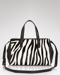 This perennially polished DKNY carryall gets wild in spot-splashed calf hair with luxe leather trim. Elegantly on-trend, let this beauty be the basis of your next fashion moment. This perennially polished DKNY carryall gets wild in spot-splashed calf hair with luxe leather trim. Elegantly on-trend, let this beauty be the basis of your next fashion moment.