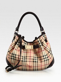 A slouchy, versatile shape featuring the signature Burberry check on smooth PVC with sleek leather trim. Leather top handle, 6½ dropAdjustable detachable leather shoulder strap, 19¾-23½ dropMagnetic snap closureOne inside zip pocketTwo inside open pocketsCotton lining14½W X 12H X 3½DImported A slouchy, versatile shape featuring the signature Burberry check on smooth PVC with sleek leather trim. Leather top handle, 6½ dropAdjustable detachable leather shoulder strap, 19¾-23½ dropMagnetic snap closureOne inside zip pocketTwo inside open pocketsCotton lining14½W X 12H X 3½DImported