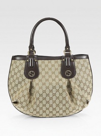 Rich GG jacquard finished with studded interlocking G detail and rich leather trim.Double top handles, 6½ dropMagnetic snap closureOne inside zip pocketTwo inside open pocketsLinen lining14W X 12H X 4DMade in Italy Rich GG jacquard finished with studded interlocking G detail and rich leather trim.Double top handles, 6½ dropMagnetic snap closureOne inside zip pocketTwo inside open pocketsLinen lining14W X 12H X 4DMade in Italy