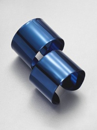 Finished in a deep shade of blue, these strikingly simple, flexible open cuffs can be worn around the upper arm for drama or at the wrist for elegance.BrassPlasticDiameter, about 3Width, about 3.5Made in Italy