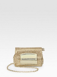 Be the star of the party in this textured, glitter fabric design with metallic leather trim and detachable strap.Detachable chain shoulder strap, 23½ dropTop zip closure with flapSatin lining5W X 3½H X 2DMade in Italy Be the star of the party in this textured, glitter fabric design with metallic leather trim and detachable strap.Detachable chain shoulder strap, 23½ dropTop zip closure with flapSatin lining5W X 3½H X 2DMade in Italy