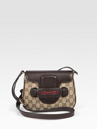 Original GG canvas with signature web detail and leather trim. Adjustable leather shoulder strap, 20-22 dropMagnetic flap closureTwo inside open pocketsNatural cotton linen lining8½W X 6H X 1½DMade in Italy Original GG canvas with signature web detail and leather trim. Adjustable leather shoulder strap, 20-22 dropMagnetic flap closureTwo inside open pocketsNatural cotton linen lining8½W X 6H X 1½DMade in Italy