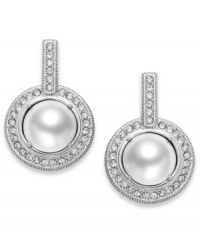 The timeless look of elegance. Eliot Danori's drop earrings feature framed simulated pearls (8 mm) with genuine mother-of-pearl coating encircled by crystals accents. Set in rhodium-plated mixed metal. Approximate diameter: 1/2 inch. The timeless look of elegance. Eliot Danori's drop earrings feature framed simulated pearls (8 mm) with genuine mother-of-pearl coating encircled by crystals accents. Set in rhodium-plated mixed metal. Approximate diameter: 1/2 inch.