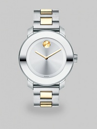 Bold watch with a two-tone stainless steel link bracelet. Swiss quartz movementWater resistant to 3 ATMRound stainless steel case, 36mm (1.4) Mirrored bezelSilvertone dial with goldtone handsTwo-tone stainless steel link braceletMade in Switzerland Bold watch with a two-tone stainless steel link bracelet. Swiss quartz movementWater resistant to 3 ATMRound stainless steel case, 36mm (1.4) Mirrored bezelSilvertone dial with goldtone handsTwo-tone stainless steel link braceletMade in Switzerland