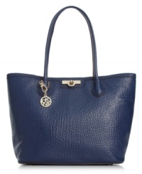 Take your everyday look uptown with this Park-Avenue-perfect design from DKNY. Sumptuous leather is accented with posh hardware and signature detailing, while the generous interior stows everyday essentials with ease. Take your everyday look uptown with this Park-Avenue-perfect design from DKNY. Sumptuous leather is accented with posh hardware and signature detailing, while the generous interior stows everyday essentials with ease.