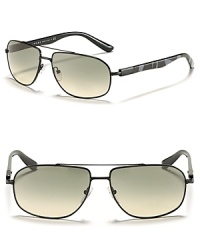 Iconic metal aviators get a modern update with camouflage printed arms and logo detail at temples. Iconic metal aviators get a modern update with camouflage printed arms and logo detail at temples.