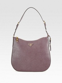 A classic style in beautiful textured saffiano lux leather.Adjustable shoulder strap, 10-11¾ dropTop zip closureOne inside zip pocketThree inside open pocketsSignature jacquard lining13W X 10¼H X 3DMade in Italy A classic style in beautiful textured saffiano lux leather.Adjustable shoulder strap, 10-11¾ dropTop zip closureOne inside zip pocketThree inside open pocketsSignature jacquard lining13W X 10¼H X 3DMade in Italy