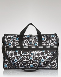 LeSportsac's signature nylon duffel is ready for travels, featuring a durable design, plenty of pockets and a cute print. It's totally ready for takeoff. LeSportsac's signature nylon duffel is ready for travels, featuring a durable design, plenty of pockets and a cute print. It's totally ready for takeoff.
