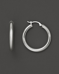 Simply chic, these 14K. white gold hoops are timeless classics. Simply chic, these 14K. white gold hoops are timeless classics.