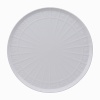 Modern in design with a raised circular pattern, made from French Limoges Porcelain. Dishwasher and microwave safe.