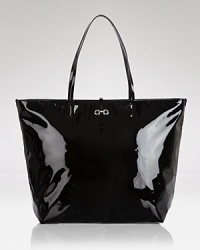 Polish up your practical portfolio with this top zip tote from Salvatore Ferragamo. Crafted from glossy patent leather and spaciously sized, it's a luxurious take on the day bag. Polish up your practical portfolio with this top zip tote from Salvatore Ferragamo. Crafted from glossy patent leather and spaciously sized, it's a luxurious take on the day bag.