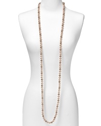 Carolee's jewels are in perfect step with fashion's love of statement baubles. Introduce a classic piece into your collection with this extra long pink pearl rope necklace, perfect for layering. Carolee's jewels are in perfect step with fashion's love of statement baubles. Introduce a classic piece into your collection with this extra long pink pearl rope necklace, perfect for layering.