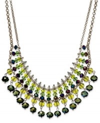 A pretty palette of green ombre glass beads (3-10 mm) decorate this chic frontal necklace from c.A.K.e. by Ali Khan. Crafted in gold tone mixed metal. Approximate length: 14 inches + 3-inch extender. Approximate drop: 1-1/2 inches. A pretty palette of green ombre glass beads (3-10 mm) decorate this chic frontal necklace from c.A.K.e. by Ali Khan. Crafted in gold tone mixed metal. Approximate length: 14 inches + 3-inch extender. Approximate drop: 1-1/2 inches.