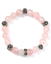 Break with conventional accessories. This hard-hitting sterling silver and onyx bracelet from Queen Baby is equal parts edgy and glamorous, accented by delicate silver rosettes. Break with conventional accessories. This hard-hitting sterling silver and onyx bracelet from Queen Baby is equal parts edgy and glamorous, accented by delicate silver rosettes.