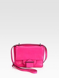 A modern design in luxurious leather allows for multiple styling options.Adjustable shoulder strap, 12½-25½ dropMagnetic snap flap closureOne open pocket under flapOne inside zip pocketCotton lining7W X 5½H X 2DImported A modern design in luxurious leather allows for multiple styling options.Adjustable shoulder strap, 12½-25½ dropMagnetic snap flap closureOne open pocket under flapOne inside zip pocketCotton lining7W X 5½H X 2DImported