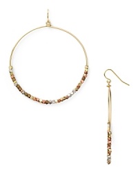 Work this season's exotic influences into your accessories collection with this pair of beaded hoop earrings from Vanessa Mooney, accented by an eclectic mix of metallic beads. Work this season's exotic influences into your accessories collection with this pair of beaded hoop earrings from Vanessa Mooney, accented by an eclectic mix of metallic beads.