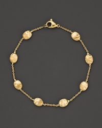 From the Siviglia collection, a bracelet with medium-sized beads, designed by Marco Bicego. From the Siviglia collection, a bracelet with medium-sized beads, designed by Marco Bicego.