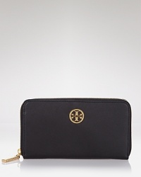 Tory Burch goes continental with this luxe, logo-topped Saffiano wallet. Tory Burch goes continental with this luxe, logo-topped Saffiano wallet.