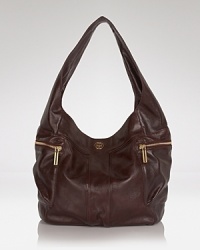 Tory Burch ups the cove-ability with this luxurious leather hobo. Equal parts slouchy and sophisticated, it flaunts a lived in look that adds a cool edge to your desk-to-dinner look. Tory Burch ups the cove-ability with this luxurious leather hobo. Equal parts slouchy and sophisticated, it flaunts a lived in look that adds a cool edge to your desk-to-dinner look.