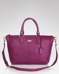 Urban cool meets fuss-free accessorizing with this leather Cole Haan satchel. It works a decidedly downtown vibe, while it takes your look from desk to dinner, and everywhere in between. Urban cool meets fuss-free accessorizing with this leather Cole Haan satchel. It works a decidedly downtown vibe, while it takes your look from desk to dinner, and everywhere in between.