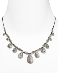 Lauren Ralph Lauren pays homage to Southwestern style with this drop necklace, accented by an evocative mix of natural cord and textured silver-plated beads. Lauren Ralph Lauren pays homage to Southwestern style with this drop necklace, accented by an evocative mix of natural cord and textured silver-plated beads.