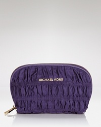 MICHAEL Michael Kors quilted cosmetics case makes a beautiful addition to your luggage collection or home vanity. MICHAEL Michael Kors quilted cosmetics case makes a beautiful addition to your luggage collection or home vanity.