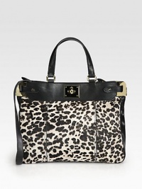 Abstract animal print hair calf trimmed in supple leather with goldtone hardware.Double leather top handles, 6½ dropDetachable leather shoulder strap, 19 dropTurnlock closureOne inside zip pocketTwo inside open pocketsSatin lining14W X 11H X 4½DImported Abstract animal print hair calf trimmed in supple leather with goldtone hardware.Double leather top handles, 6½ dropDetachable leather shoulder strap, 19 dropTurnlock closureOne inside zip pocketTwo inside open pocketsSatin lining14W X 11H X 4½DImported