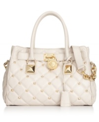 Elegance with attitude, this luxe lovely from MICHAEL Michael Kors features diamond-shaped stud accents and chain-link detailing. Crafted from sumptuous leather with a pocket-trimmed interior, it's ideal for day or night endeavors. Elegance with attitude, this luxe lovely from MICHAEL Michael Kors features diamond-shaped stud accents and chain-link detailing. Crafted from sumptuous leather with a pocket-trimmed interior, it's ideal for day or night endeavors.